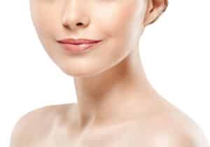 Attractive woman with full, voluminous face thanks to collagen protein production and medical esthetic treatments.